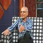 57208